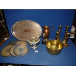A quantity of metalware to include two pairs of candlesticks, coasters, serving tray,