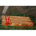 Fifteen lengths of used softwood 3/4'' x 4'' x 47''.