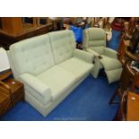 Pale green two seater settee and armchair.