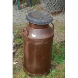 Metal milk churn marked 'Williams Ystrad, Rhondda'.