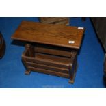 An oak magazine rack/table.