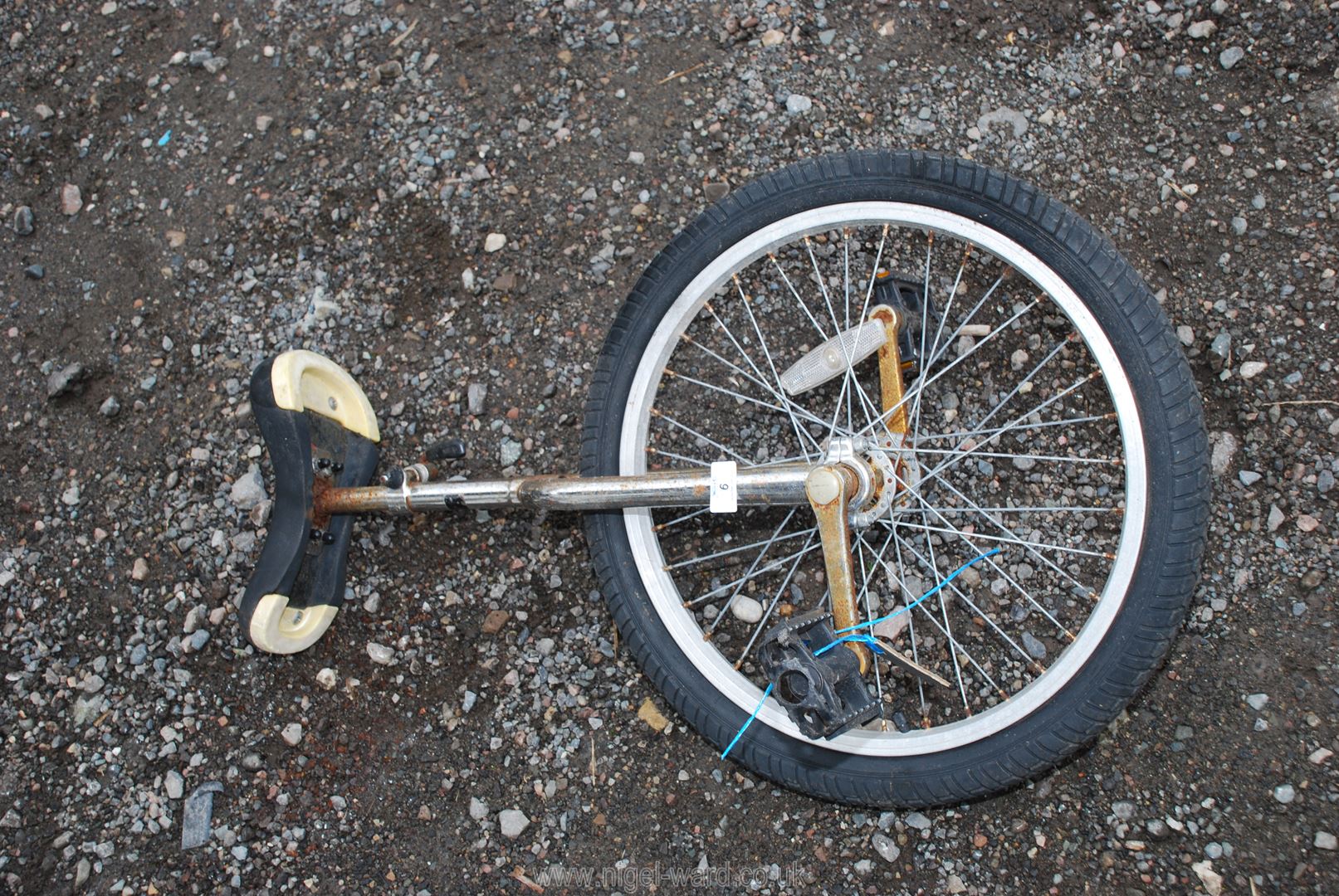 A Unicycle with a 20" wheel.