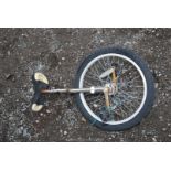 A Unicycle with a 20" wheel.