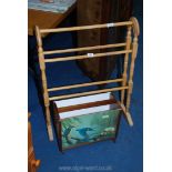 Wooden magazine rack and a towel rail.