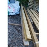 Two treated lengths of softwood 7'' x 3'' x 180'' and two untreated lengths of the same dimensions.