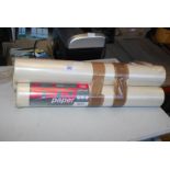 Three rolls of thousand grade lining paper.