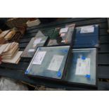 Quantity of unused double glazing panels and one used panel.