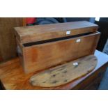 Wooden box with detachable lid and a piece of driftwood.