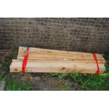 Fifteen lengths of used softwood 4'' x 3/4'' x 47''.