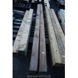 Four treated softwood posts 4'' square x 121''.