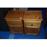 A pair of pine bedside tables.