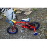 Child's Spiderman bike with stabilisers.