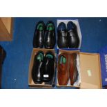 Four pairs of men's shoes, size 11.