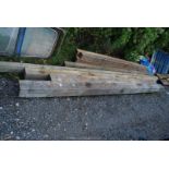 Five lengths of softwood timber from 5'' x 3'' up to 6'' square and up to 180'' long.