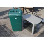 TV stand and compost wheelie bin.