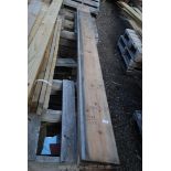 Four lengths of untreated softwood 8 1/2'' x 3/4'' up to 132'' long.