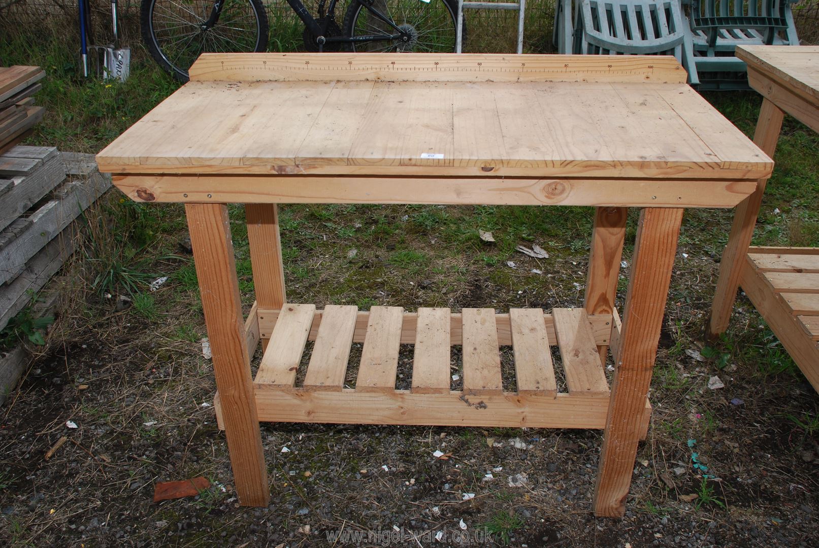 A pine potting shed table, 46" x 21 1/2" x 36" high.