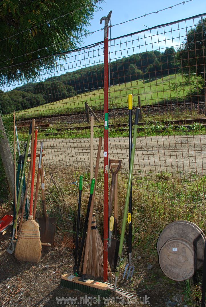 A branch lopper, rakes, brooms, spades etc.