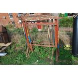 Two pairs of builders metal trestles.