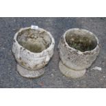 Two urn shaped concrete planters, 9'' diameter x 10'' high.