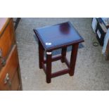 Small wooden occasional table.