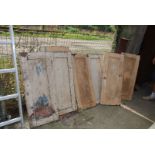 Eight painted pine cupboard doors approx 17" x 40".
