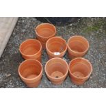 Seven terracotta flower pots @ 6'' each