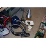 Miele vacuum, desk lamp, set of kitchen scales and weights.