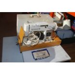 Electric Seamstress cased sewing machine