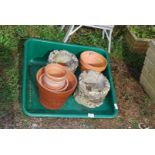 Plastic potting tray, terracotta flower pots, concrete planters etc.