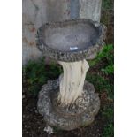 Concrete bird bath 26" high.