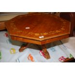 An octagonal coffee table 29" x 29" x 13".