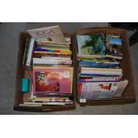 Two boxes of books including Yoga made Easy, cook books etc.