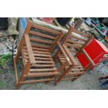 Two wooden garden chairs.