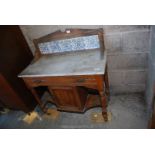 Tiled back, marble topped washstand.
