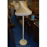 White painted reeded column standard lamp.