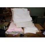 Three boxes of linen, sheets etc.