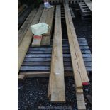 Three lengths of oak timbers 6 1/2'' x 1 3/4'' x 170''.