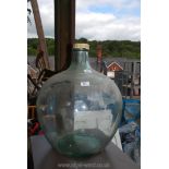 Large clear glass carbouy 17'' diameter 20'' high.