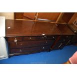 A Stag four short over two long chest of drawers plus a four drawer chest of drawers.