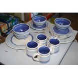 Sixteen piece, four setting dinner service: plates, soup bowls,