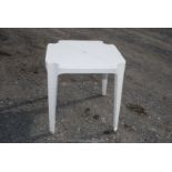 Plastic patio table 28" x 28" x 28".