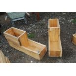 Two home made wooden two tier planters, each 34'' x 10'' x 16'' high.