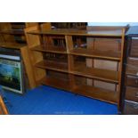 Open back six sectioned bookcase, 61'' x 45'' x 12''.