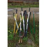 A quantity of lawn shears and bill hooks.