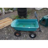 Pull along garden trolley on pneumatic tyres.