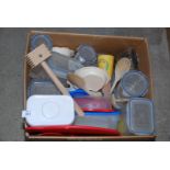 Box of kitchen storage jars and wooden utensils