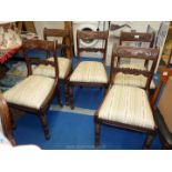 A set of five mahogany framed dining chairs having turned front legs,