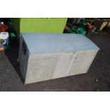 Plastic storage box 45" x 20" x 22" high.