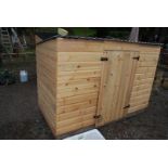 Small home made wooden garden/storage shed, 78'' x 37'' x 55'' high.